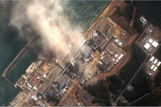 The No. 3 reactor building of the Fukushima Daiichi nuclear plant burned Monday after a blast following an earthquake and tsunami.